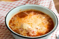 Hearty Pizza Soup Recipe: Cheesy Tomato and Italian Sausage Stew