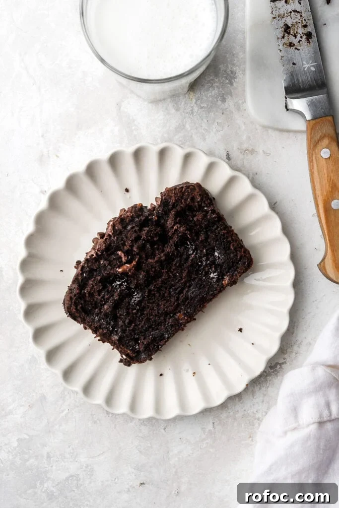 Decadent Chocolate Banana Bread Recipe with Melted Chips 3 slice of chocolate banana bread