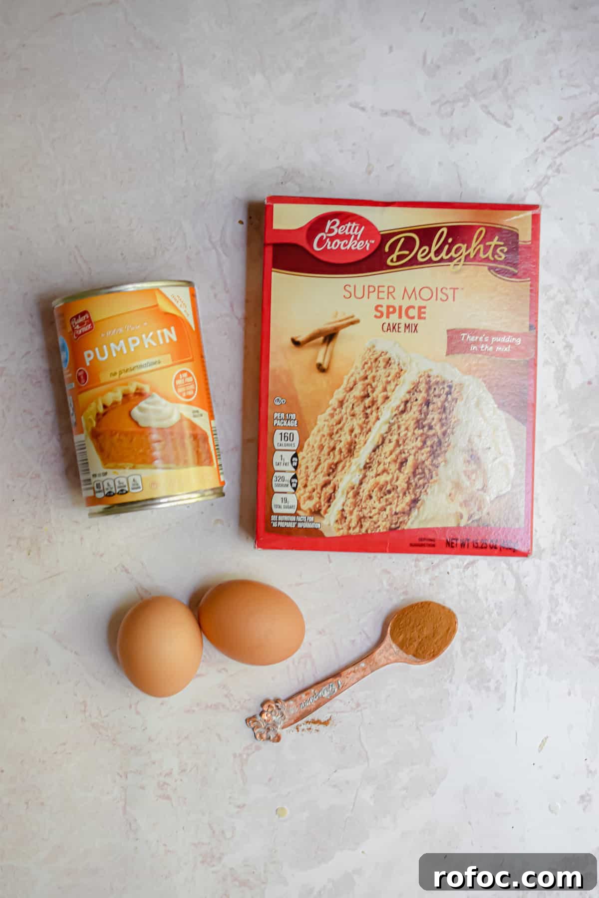 Moist Pumpkin Bread Made with Cake Mix in 1 Bowl 3 An overhead shot of the ingredients for the pumpkin bread with cake mix.