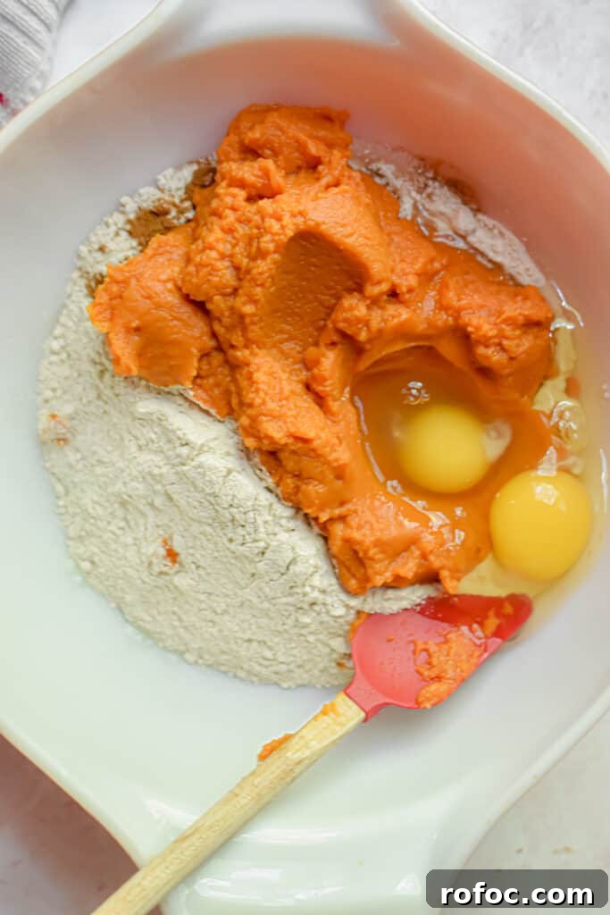 Moist Pumpkin Bread Made with Cake Mix in 1 Bowl 5 The ingredients are mixed together in a large bowl.