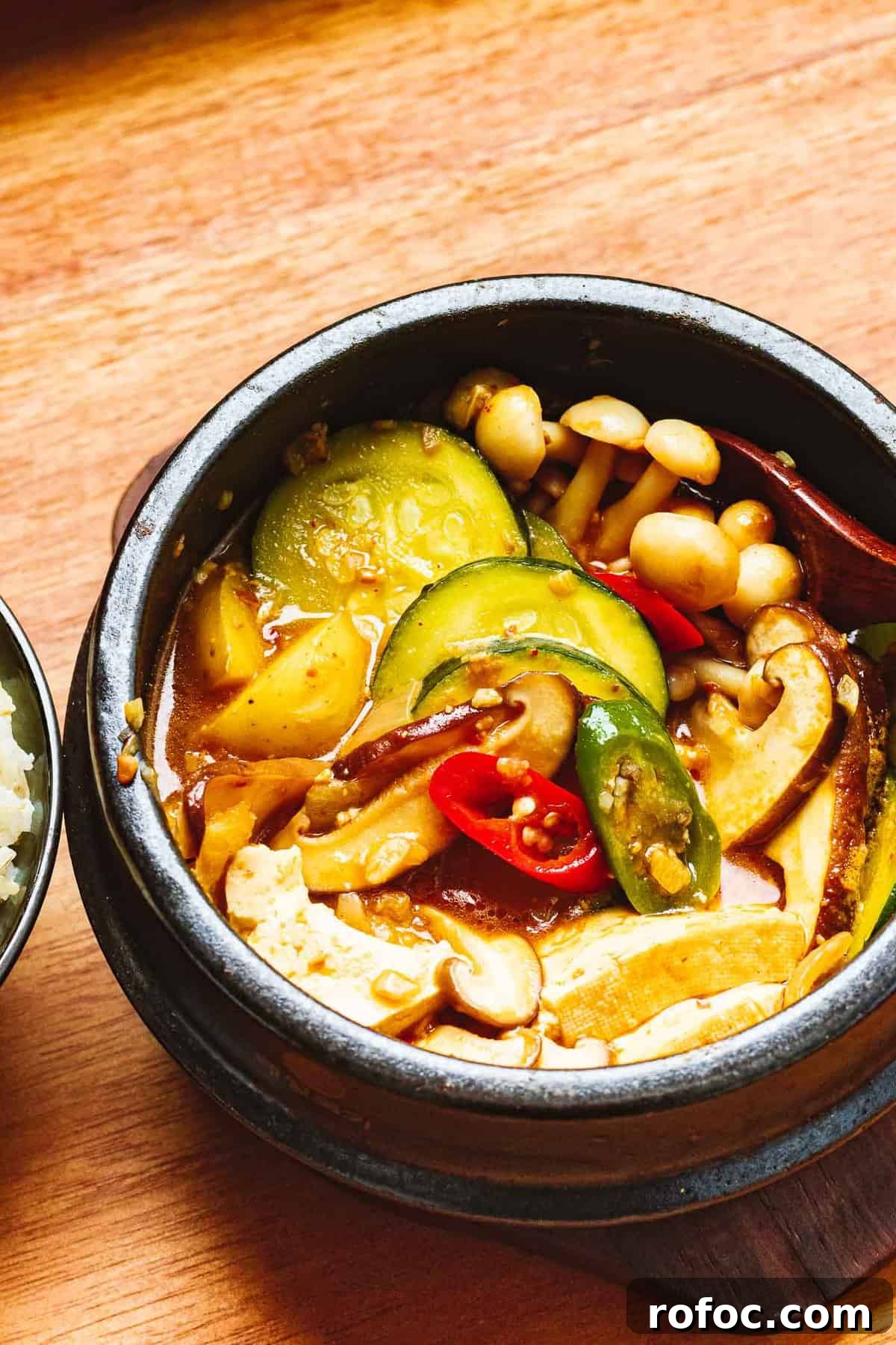 Authentic Doenjang Jjigae Recipe: Korean Soybean Paste Stew Guide 8 Korean soybean paste stew with zucchini, mushrooms, and peppers.