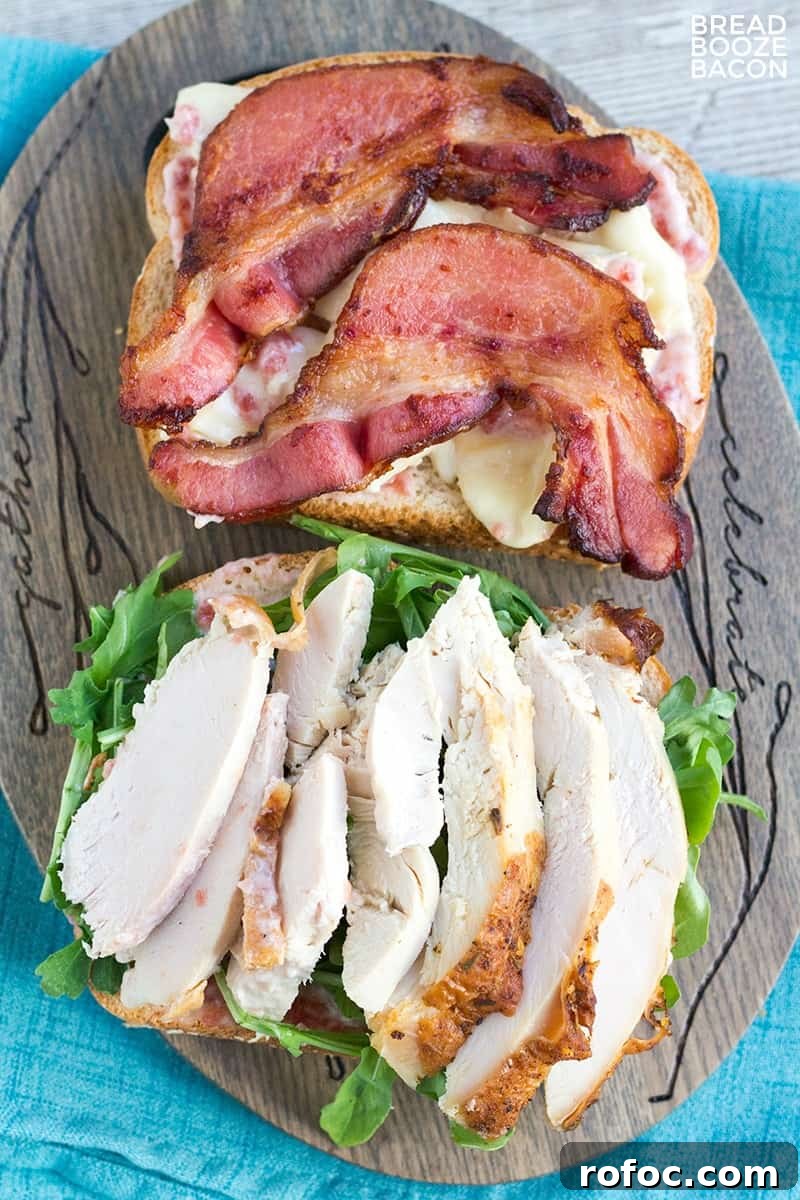 Cranberry, Brie & Bacon Turkey Sandwich Recipe 4 Sandwich ingredients on wooden board