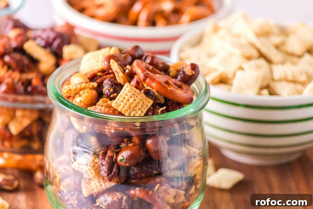 50 Quick Dinner Ideas to Make When You Don't Feel Like Cooking 14 A variety of snacks including mixed nuts, pretzels, cool ranch jerky, and cereal in bowls on a wooden table.