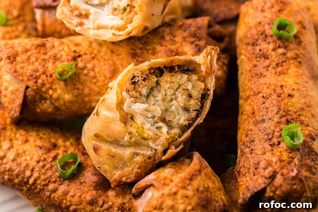 50 Quick Dinner Ideas to Make When You Don't Feel Like Cooking 9 A plate of egg rolls and a bowl of dipping sacue.