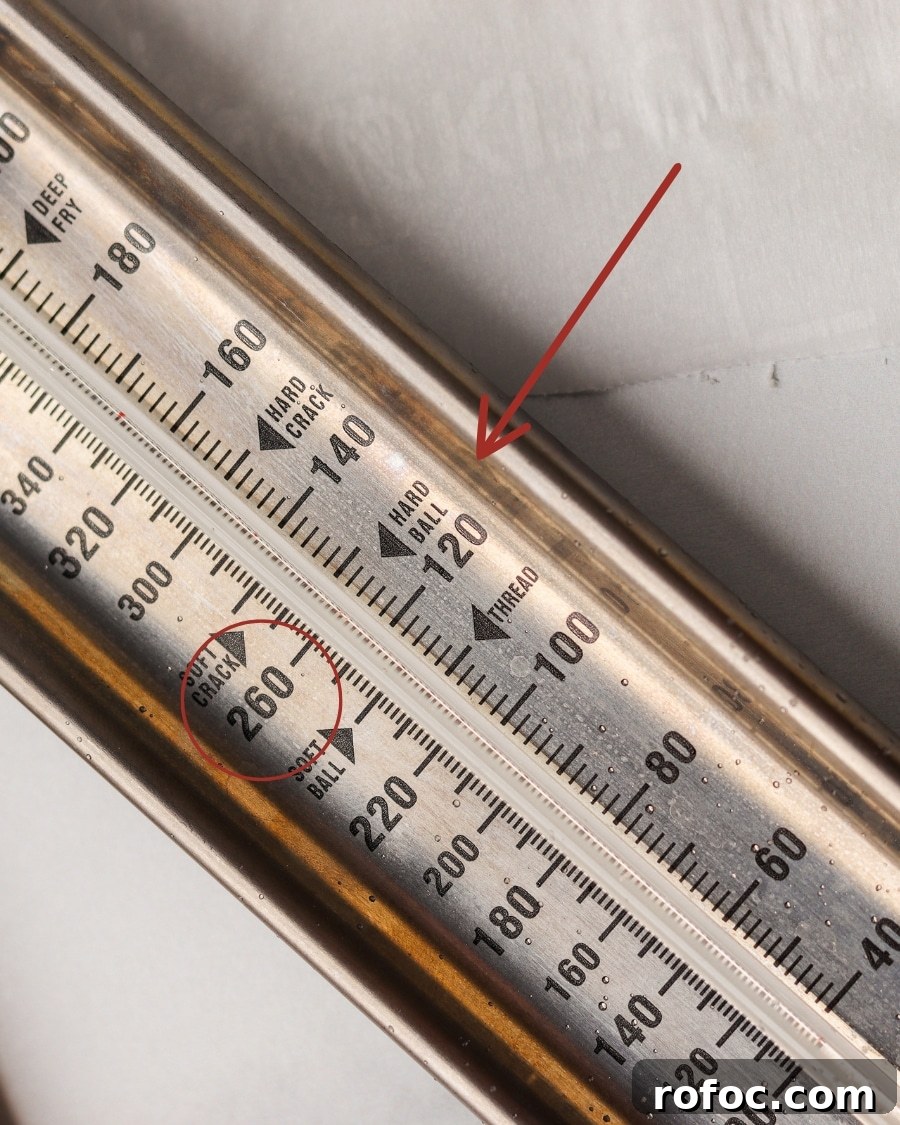 Keto Divinity Recipe: Low-Carb Coconut-Almond Candy 6 candy thermometer showing correct candy stage for syrup