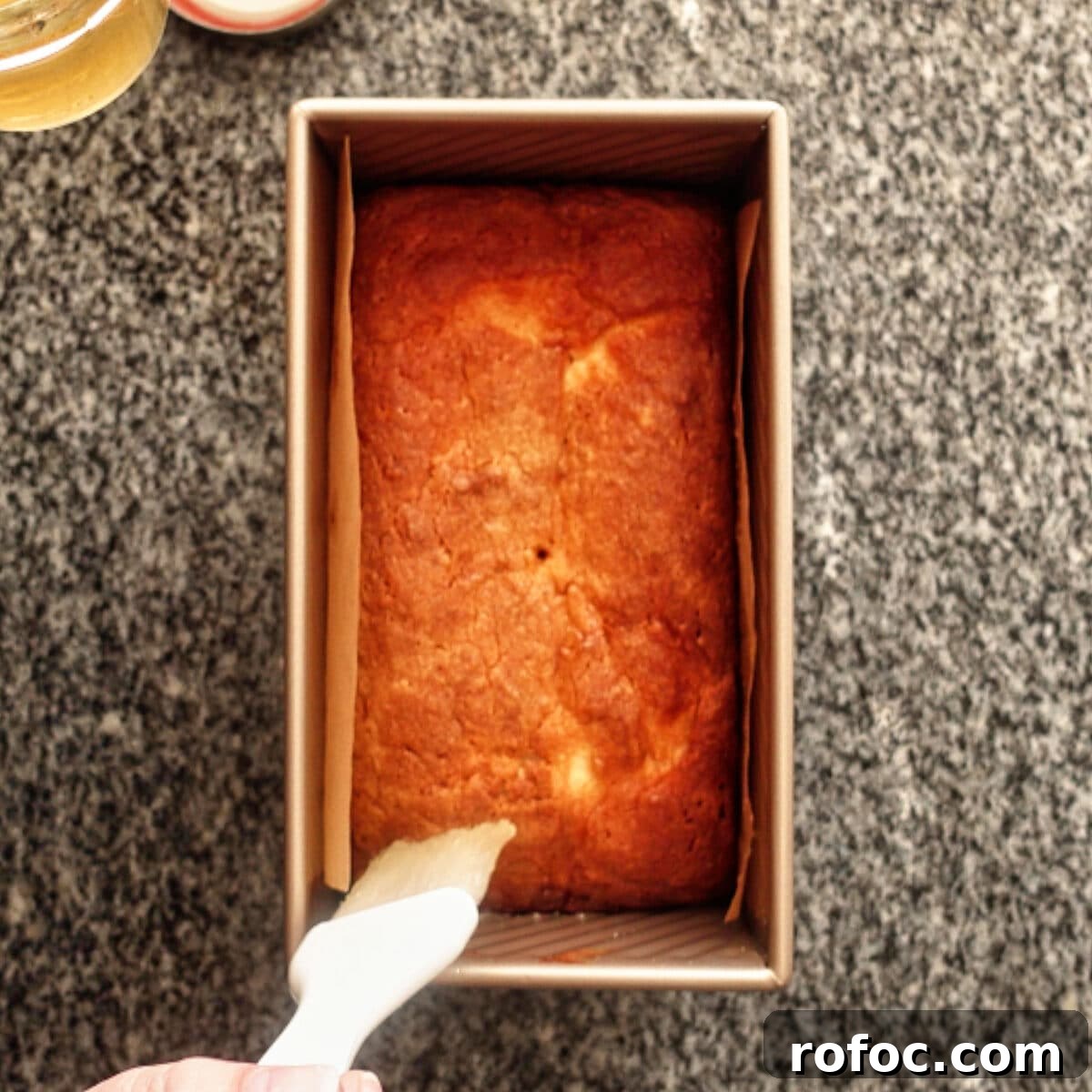 Gluten-Free Lemon Loaf: Starbucks Copycat Recipe for Moist Zest 12 brushing lemon simple syrup over top of cake.