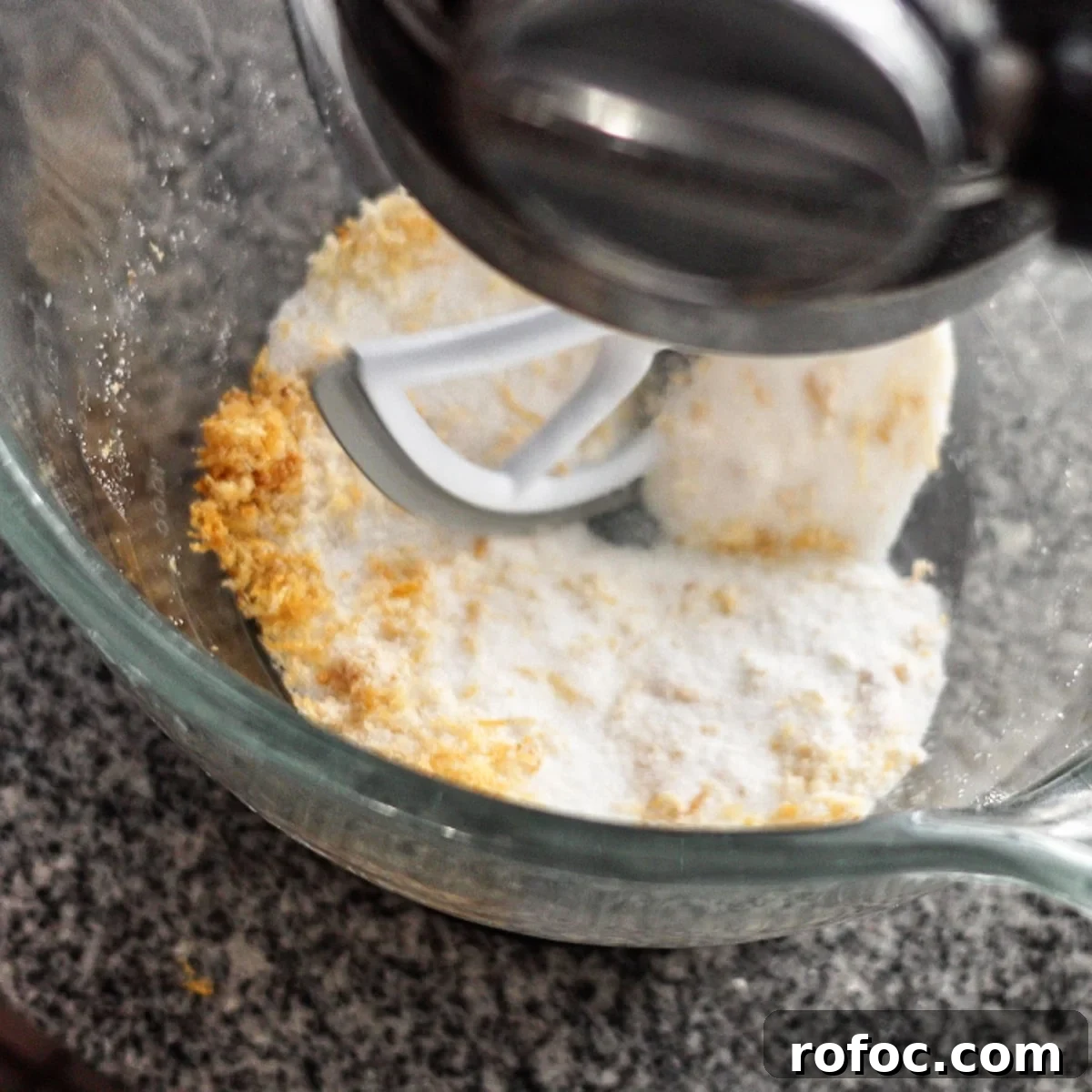 Gluten-Free Lemon Loaf: Starbucks Copycat Recipe for Moist Zest 6 mixing lemon zest and sugar in bowl of stand mixer.