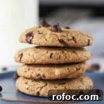 Ultimate Chewy Chocolate Chip Cookies Made with Melted Butter 7 Stack of four chocolate chip cookies.