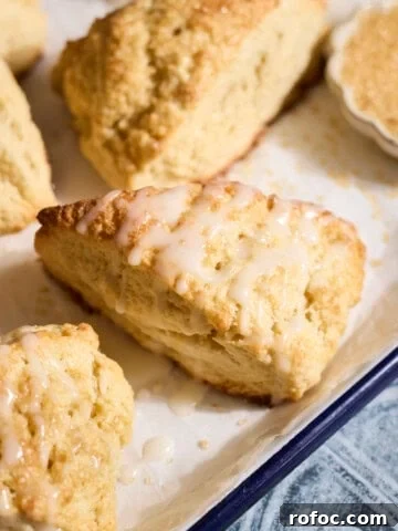 Sourdough Discard Scones drizzled with glaze.