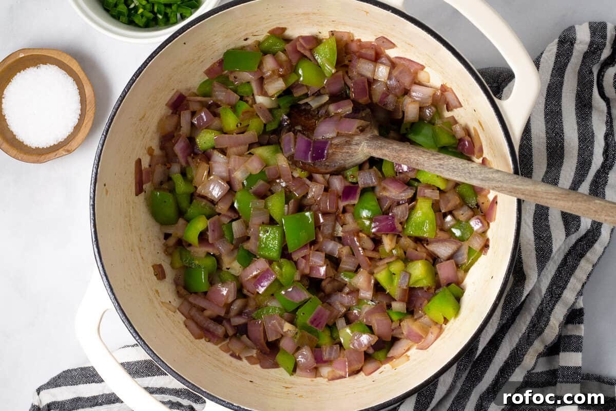 Large white pot filled with seared short ribs