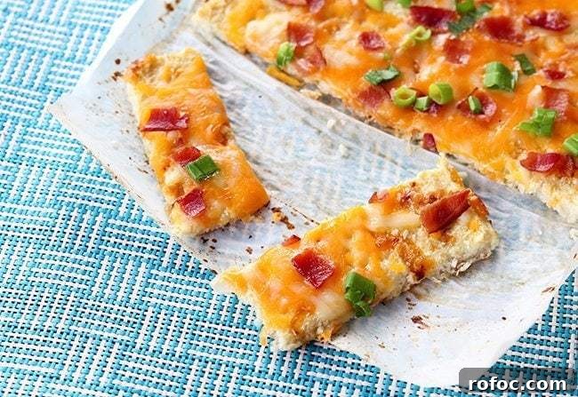 Cheesy Loaded Cauliflower Bread Recipe for Low-Carb Comfort Food 2 Cheesy Loaded Cauliflower Bread