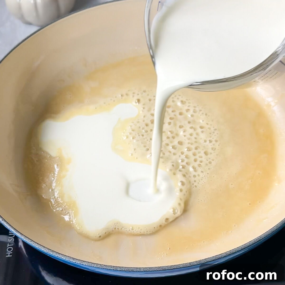 Baked Three-Cheese Mac and Cheese Recipe — Ultra Melty Comfort Dish 4 make the roux & add in the heavy cream & milk!