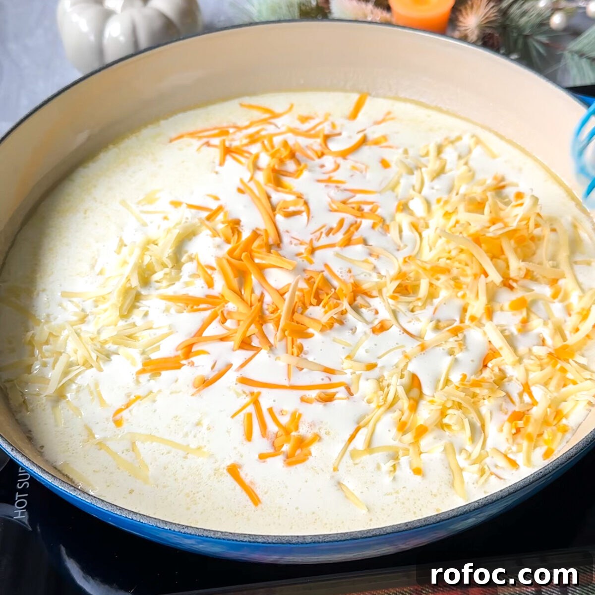 Baked Three-Cheese Mac and Cheese Recipe — Ultra Melty Comfort Dish 5 Add all the cheeses & our spices!