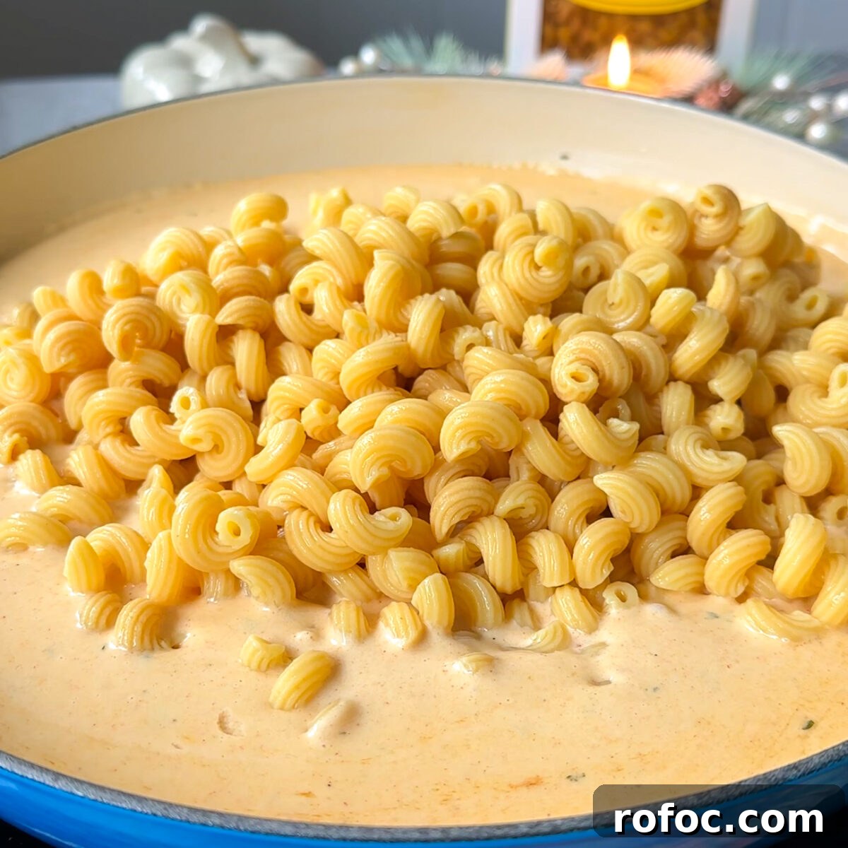Baked Three-Cheese Mac and Cheese Recipe — Ultra Melty Comfort Dish 6 Add in the pasta