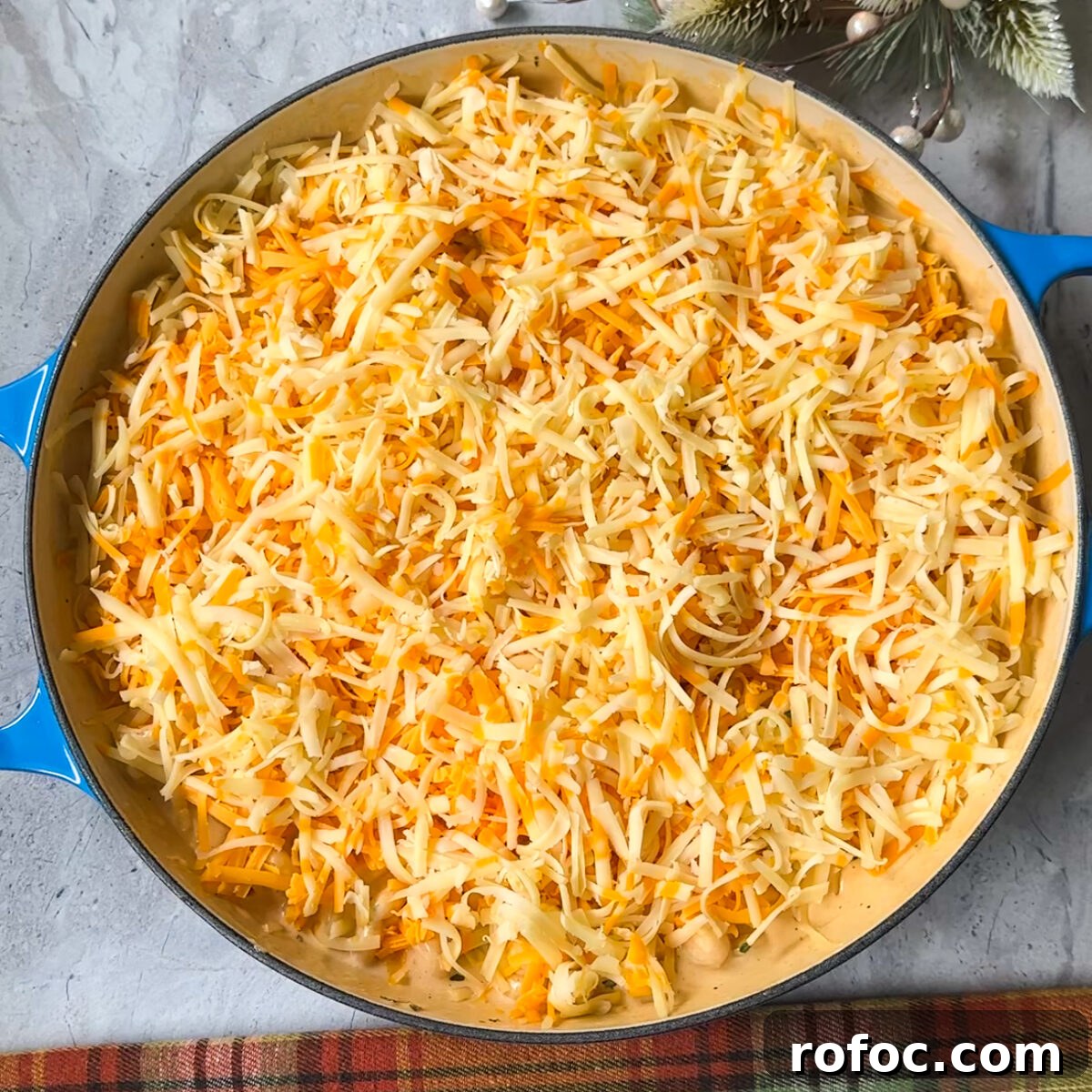 Baked Three-Cheese Mac and Cheese Recipe — Ultra Melty Comfort Dish 7 Cover in cheese & bake!