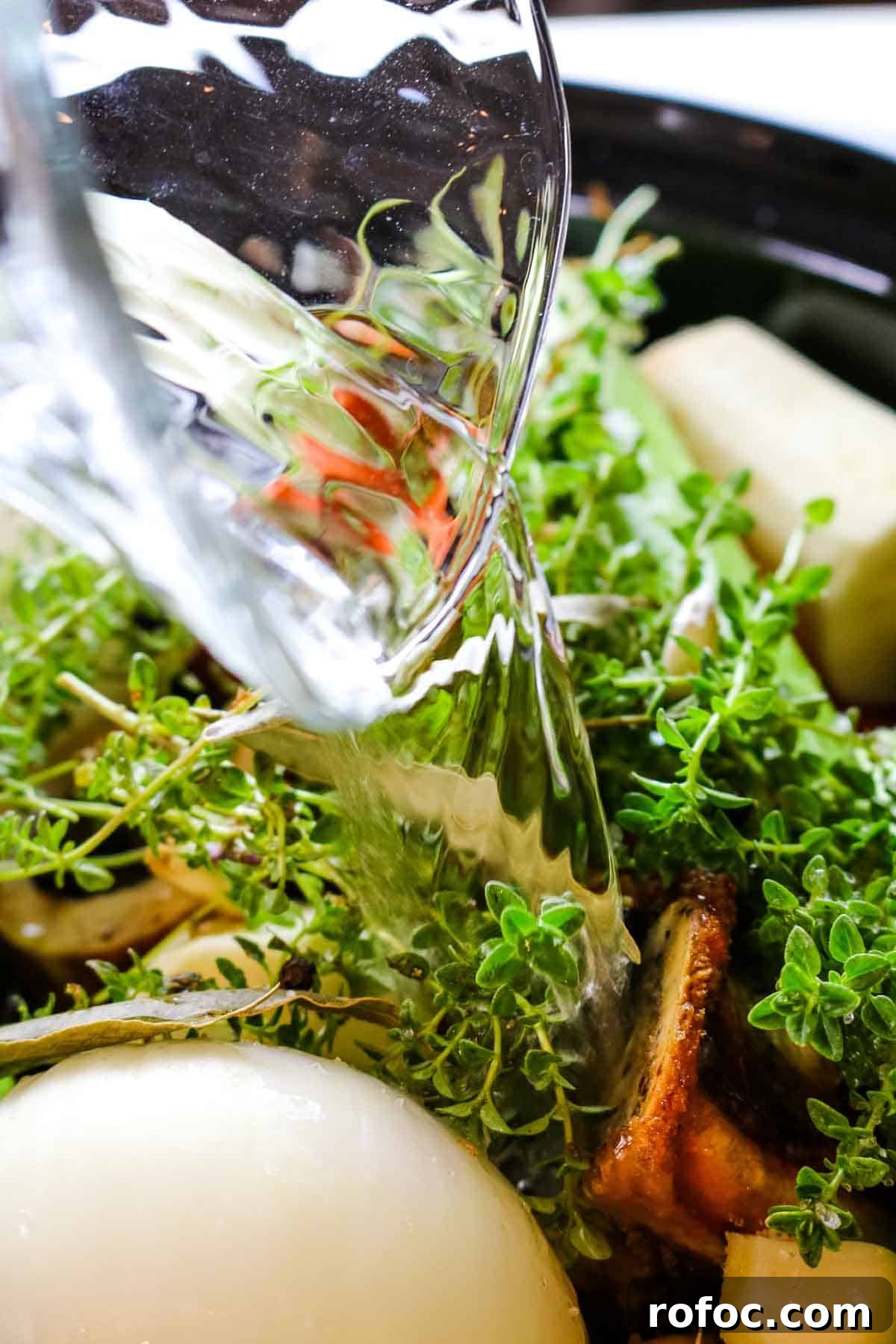 Rich Homemade Beef Bone Broth Recipe for Deep Flavor and Nutrition 9 adding water to broth.