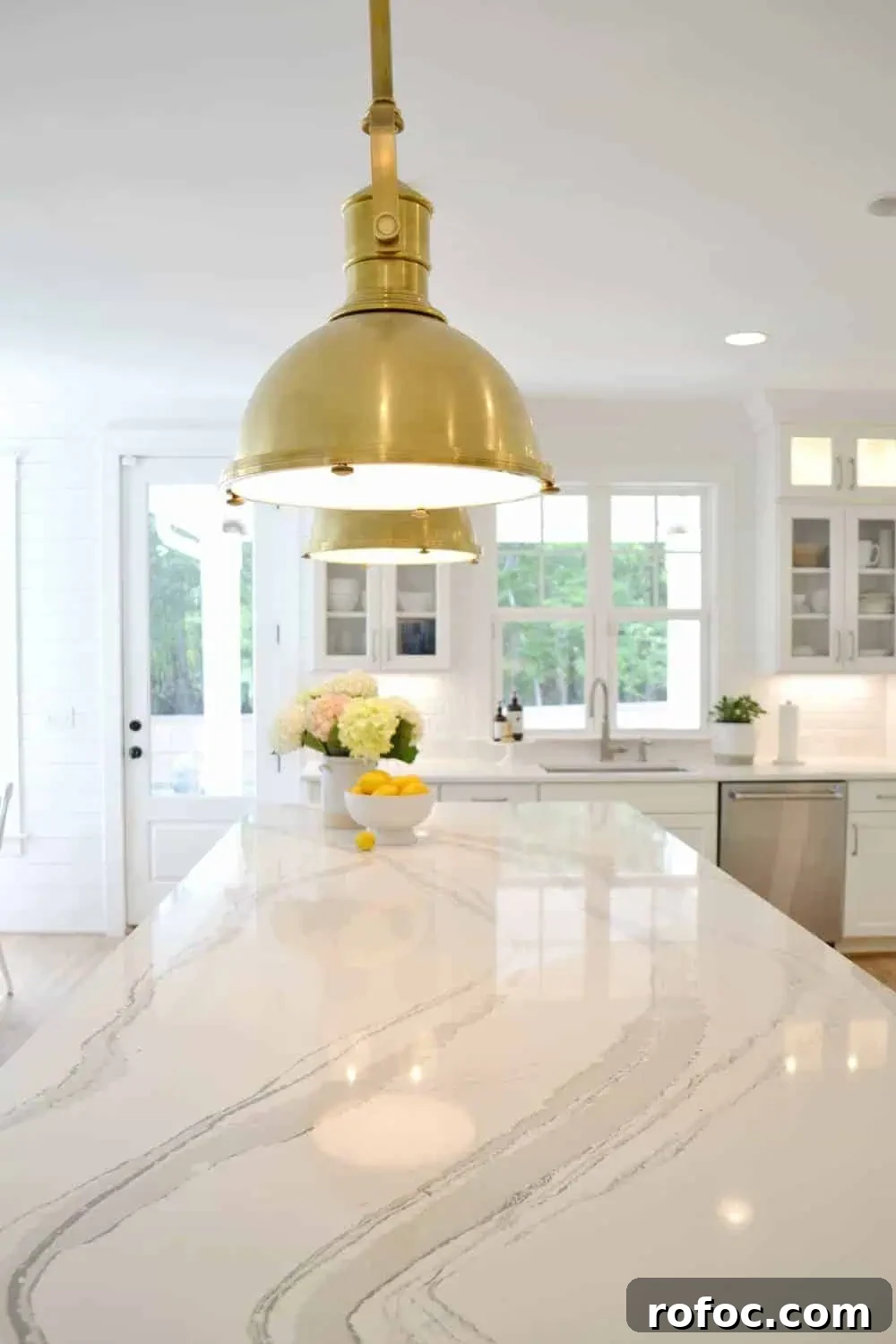 Coastal Kitchen Design Ideas with Our Complete Remodel Details 12 quartz and brass pendant detail