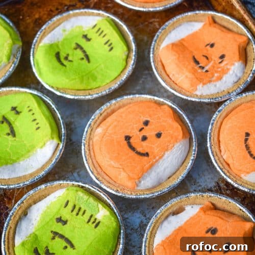halloween peeps mini s'mores pies on a metal baking sheet