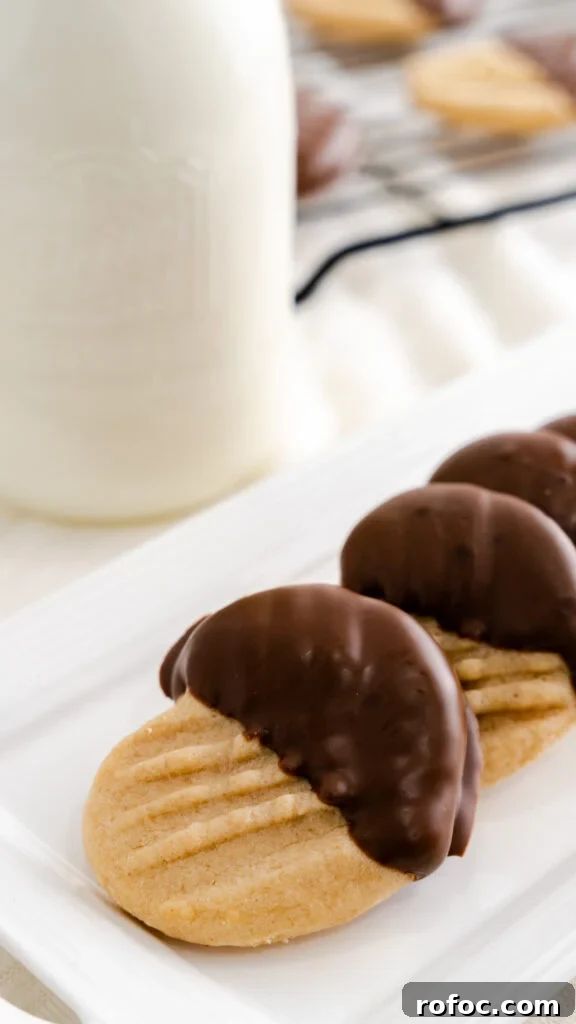 Heart-Shaped Peanut Butter Cookies Recipe for Valentine’s Day 3 Heart peanut butter cookies and a glass of milk.