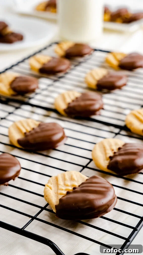 Heart-Shaped Peanut Butter Cookies Recipe for Valentine’s Day 4 Peanut butter cookies on cooling rack made for Valentine’s Day.