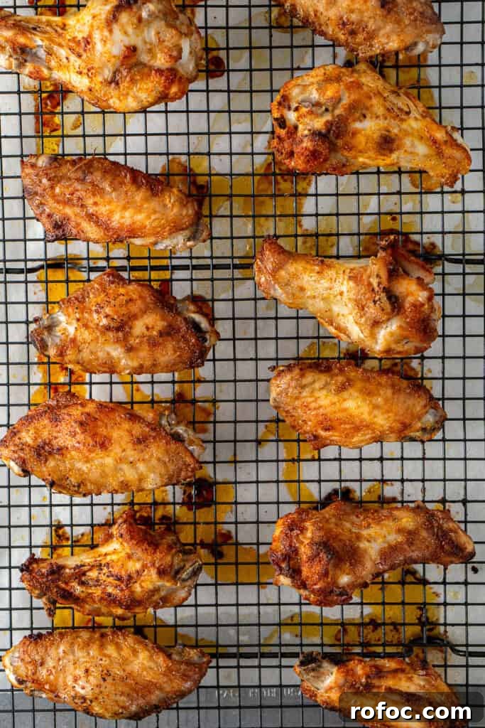 Spicy Honey-Glazed Chicken Wings Recipe for Game Day 9 The crispy baked chicken wings.