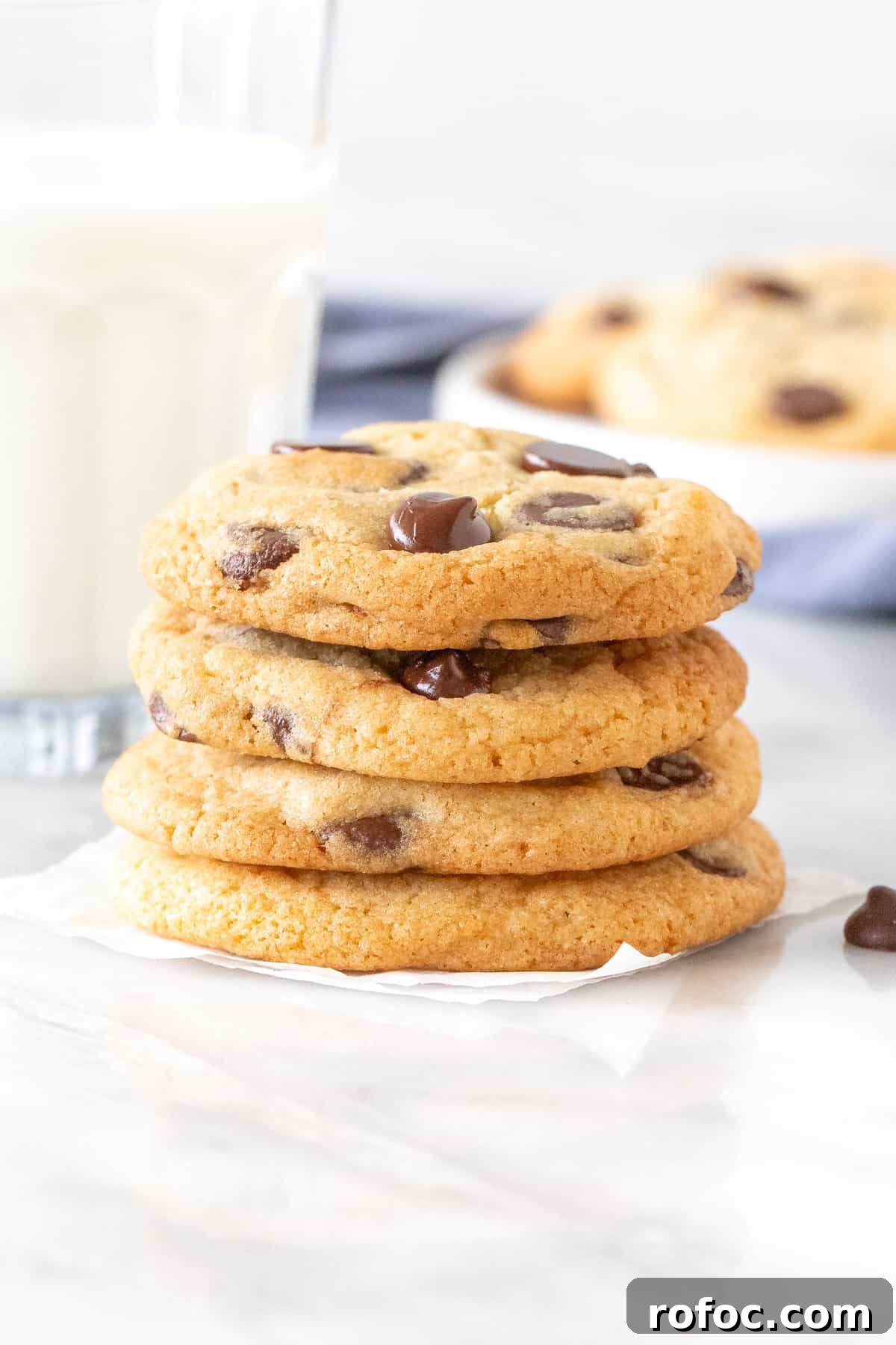 Chewy Chocolate Chip Cookies Made Without Brown Sugar 3 Stack of chocolate chip cookies with a glass of milk