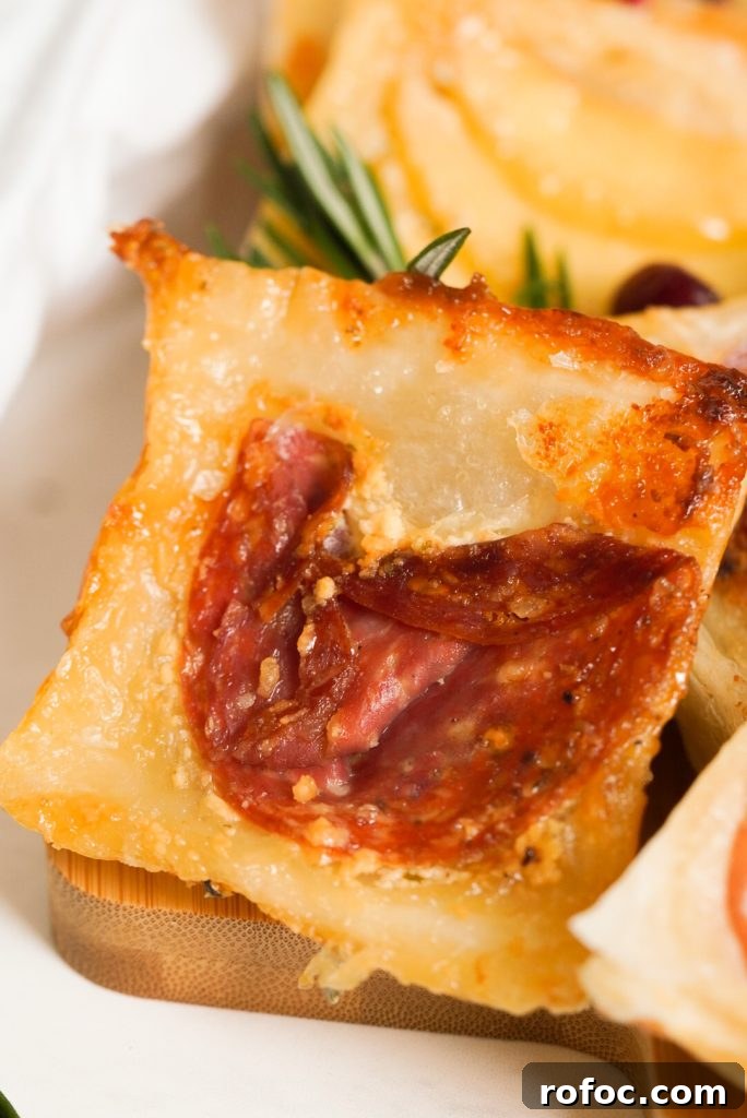 Baked Goat Cheese Tarts: Simple Party Appetizer Recipe 3 close up shot of a goat cheese puff pastry tart