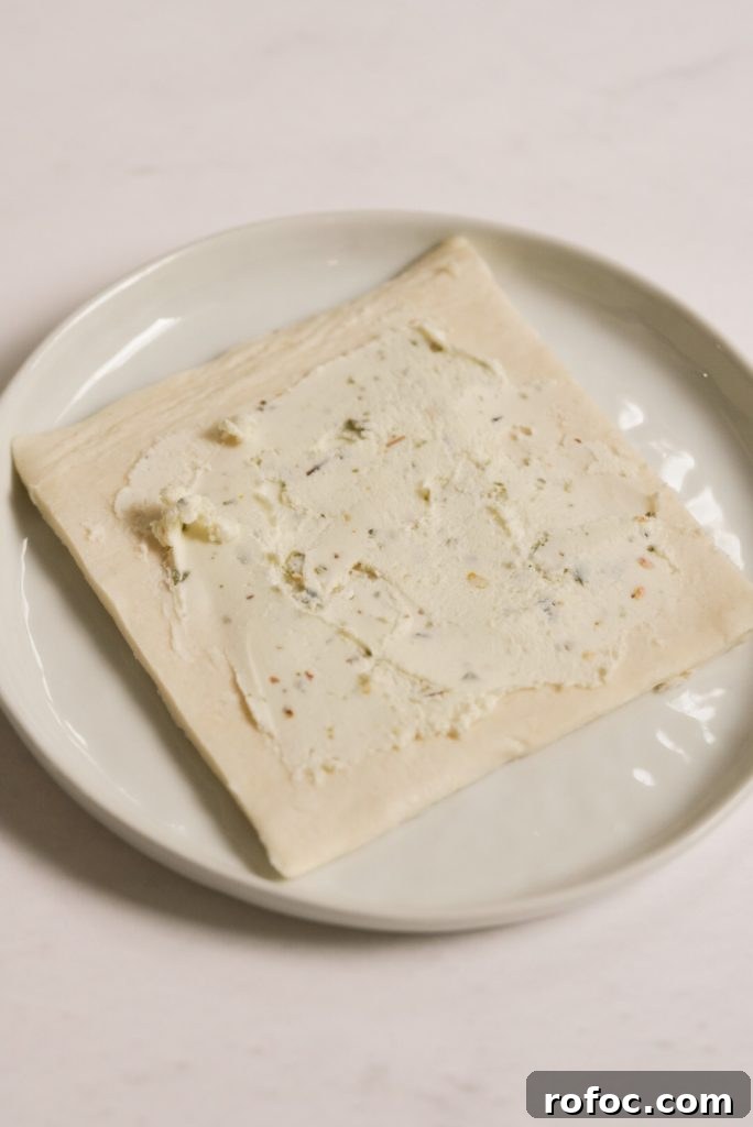 Baked Goat Cheese Tarts: Simple Party Appetizer Recipe 8 puff pastry rectangle topped with herbed goat cheese