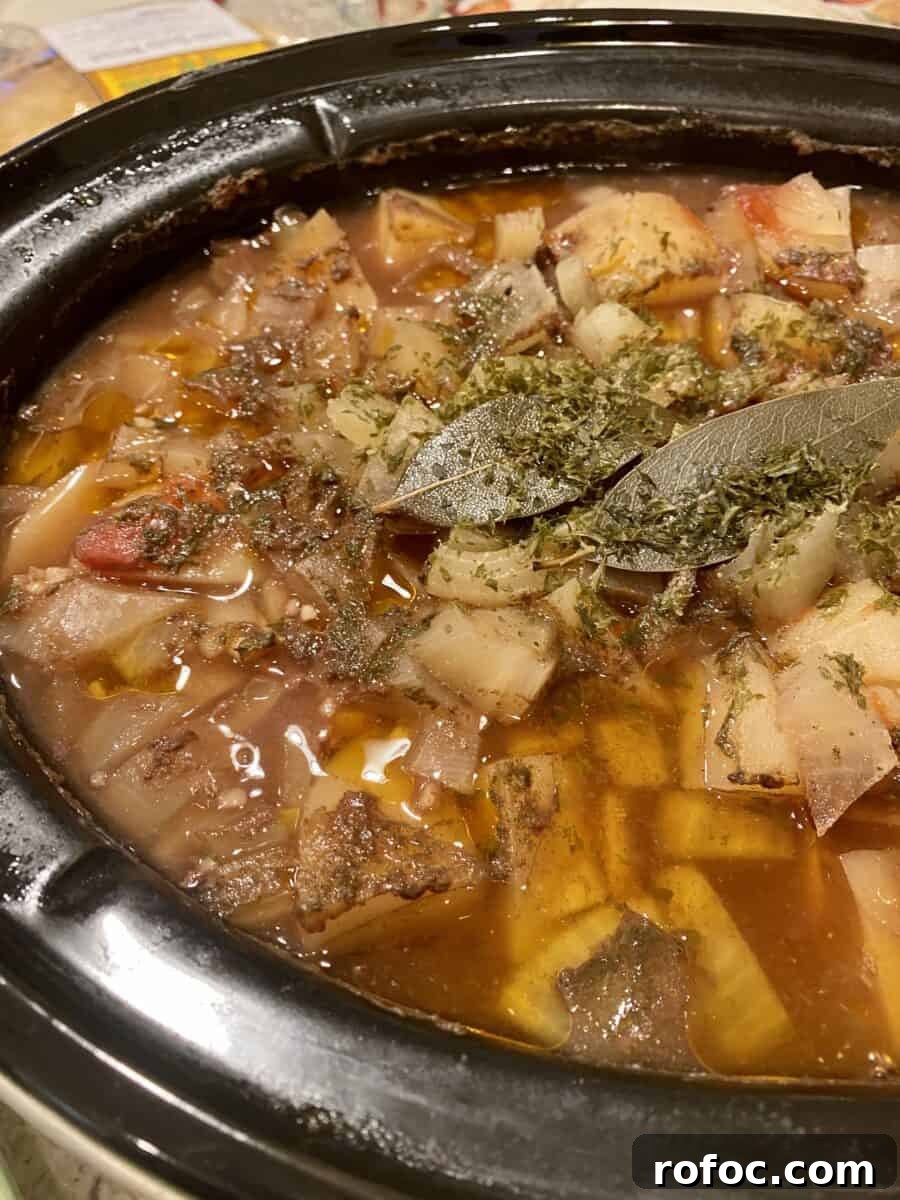 Traditional Irish Beef Stew Recipe for Hearty Weeknight Dinners 14 A crockpot full of cooked St. Patrick's Day stew.