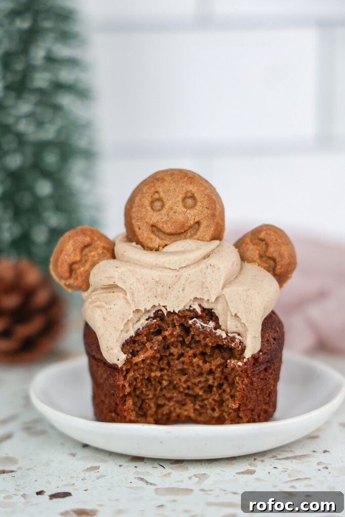 Pumpkin Cupcakes with Gingerbread Cream Cheese Frosting Recipe 3 Gluten-free pumpkin spice cupcakes with cream cheese frosting and gingerbread men cookies.