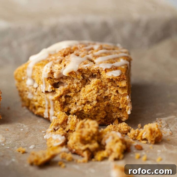 gluten free pumpkin scones topped with maple glaze