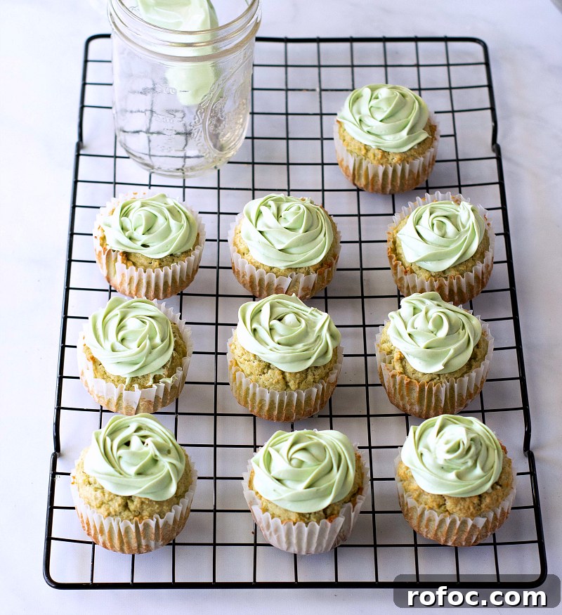 Keto Matcha Cupcakes: Low-Carb Green Tea Cupcake Recipe 5 frosted cupcakes on cooling rack