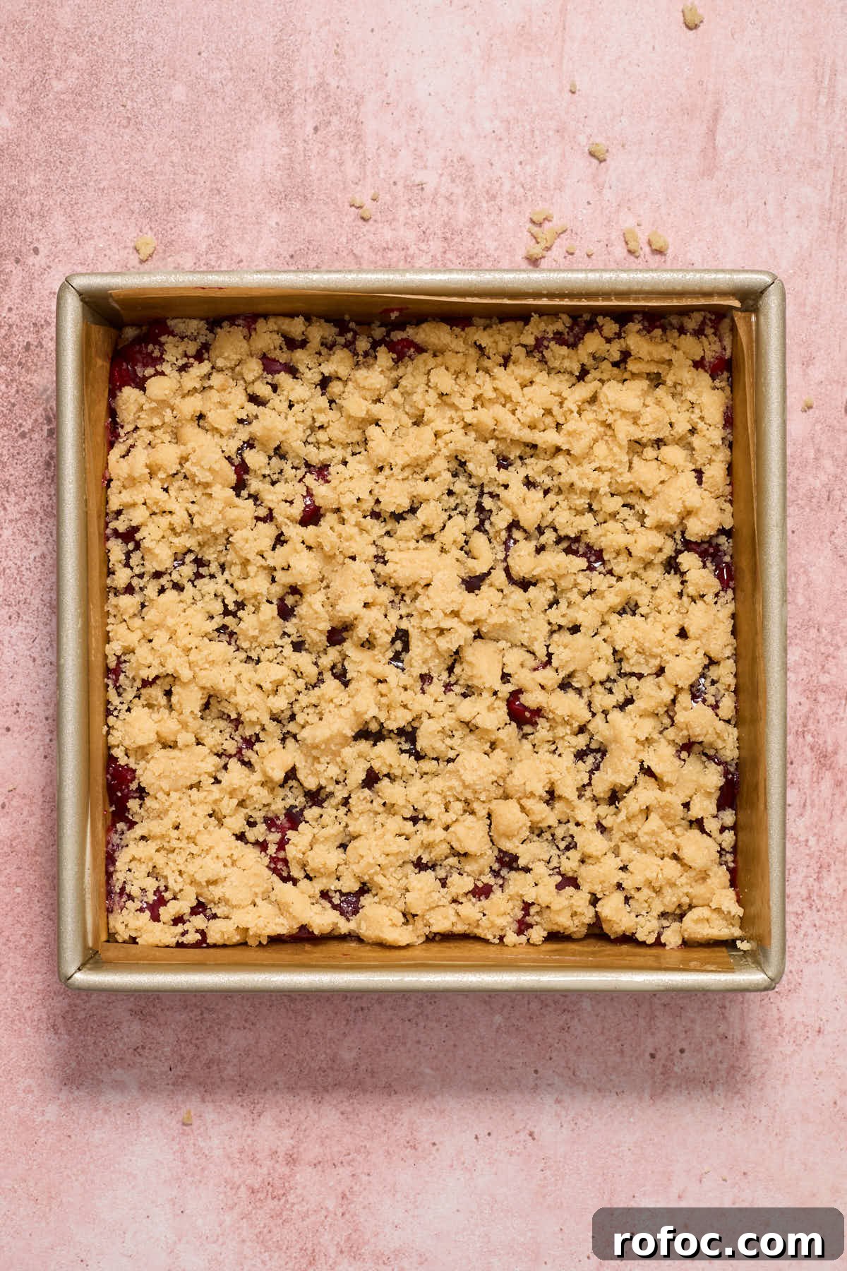 Almond Flour Cherry Pie Bars Recipe — Tender Cherry Dessert Bars 10 Topping sprinkled over cherry filling.