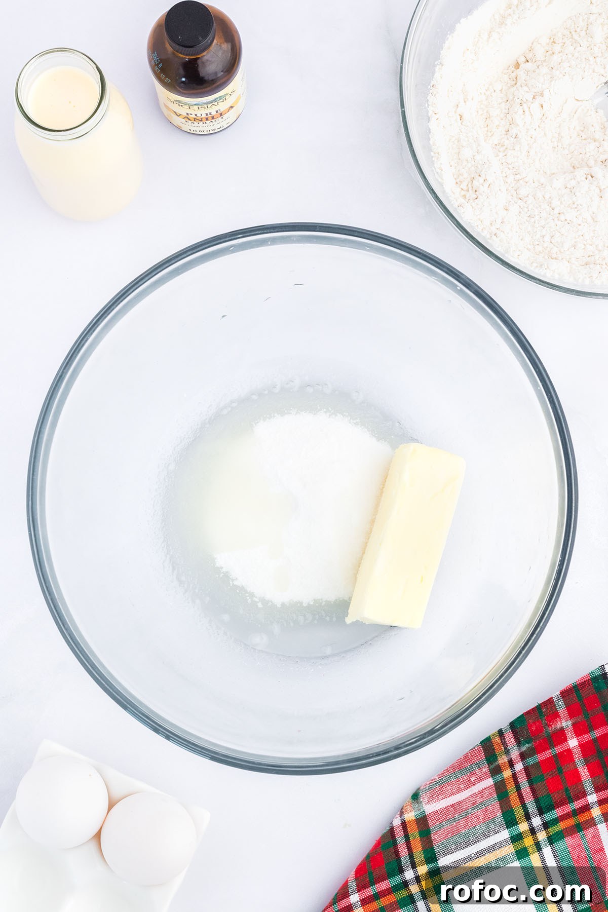 Eggnog Cupcakes with Spiced Rum Buttercream Filling 5 Butter, sugar, and oil in a glass mixing bowl.