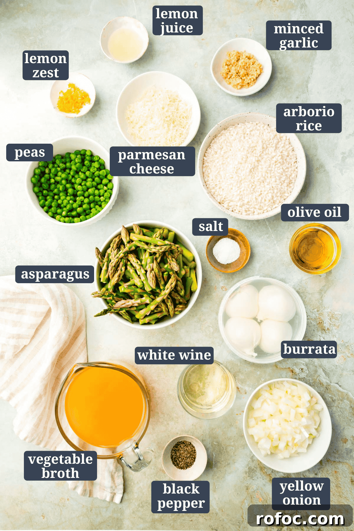 Creamy Asparagus and Pea Risotto with Burrata Cheese 3 Small bowls on a table filled with ingredients to make pea and asparagus risotto with burrata with text overlay.