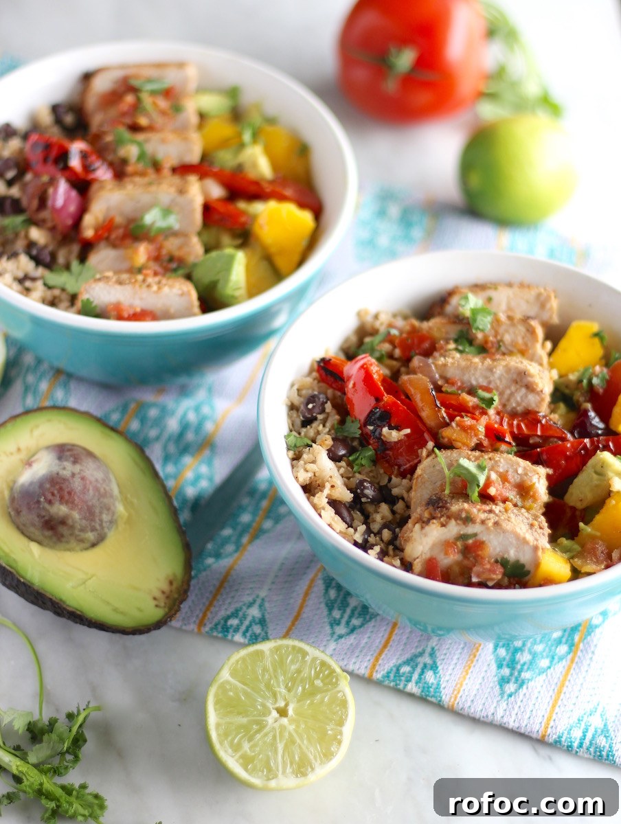 Grilled Pork Burrito Bowls - a gluten-free, paleo-friendly rice bowl topped with tender pork, mango guacamole, and fresh salsa! | fedandfulfilled.com