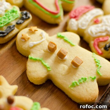 Iced Christmas Cookies: How to Cut Shapes and Decorate Sugar Cookies 3 gingerbread men decorated with royal icing