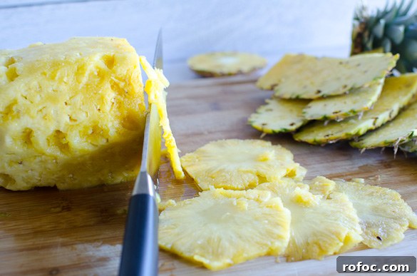 Crispy Dried Pineapple Flowers: Step-by-Step Guide 5 slicing pineapple very thin