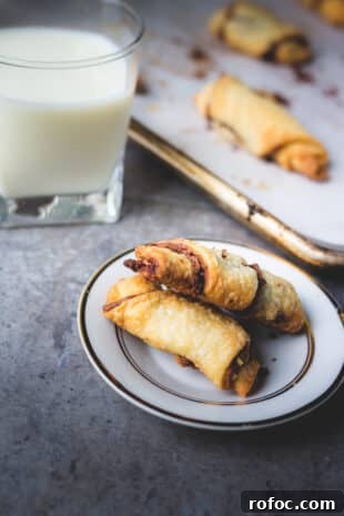 Decadent Nutella Rugelach Recipe: Flaky Chocolate-Filled Pastries 3 Nutella Rugelach on a plate