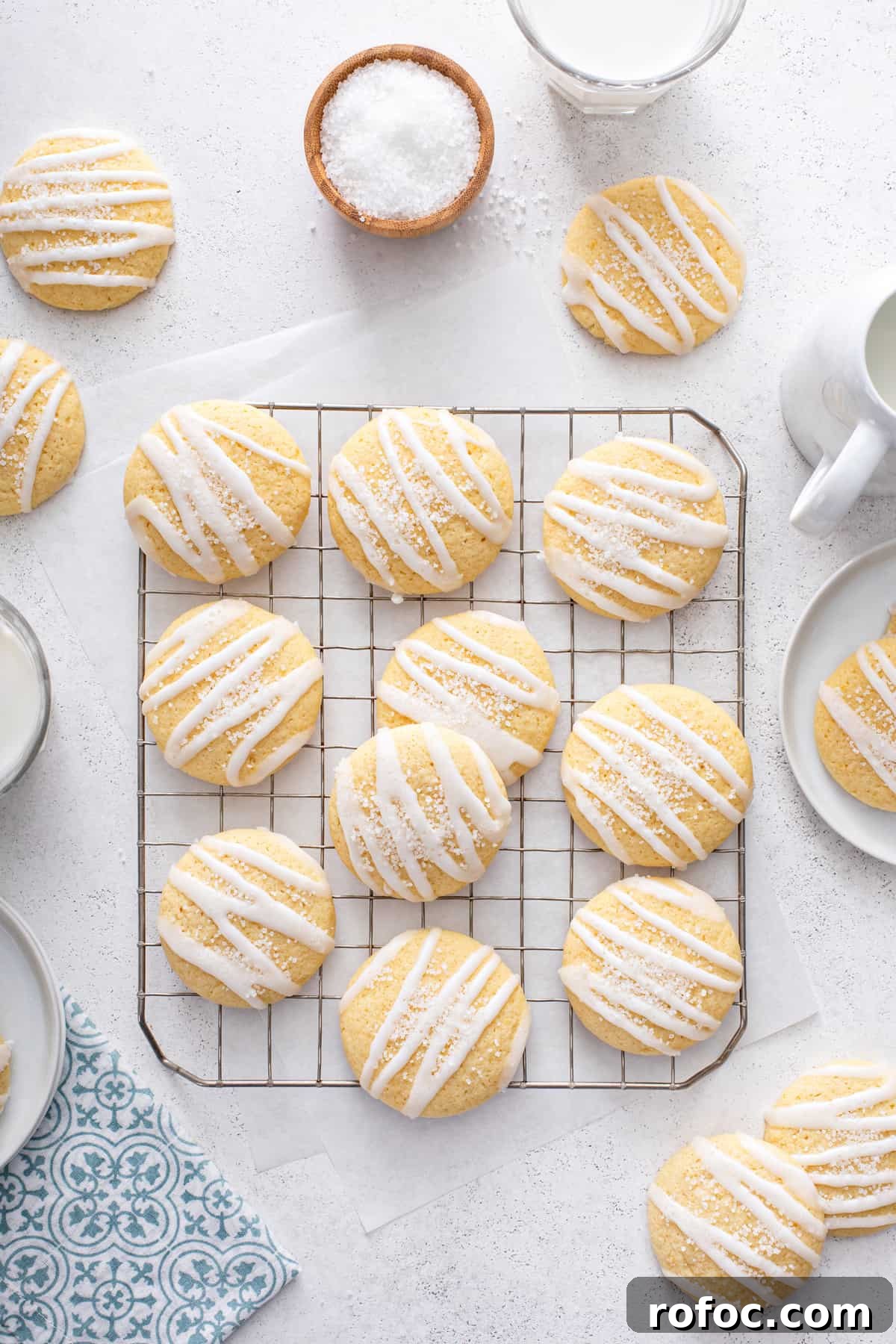 Overhead view of glazed pound cake cookies on a wire cooling rack.