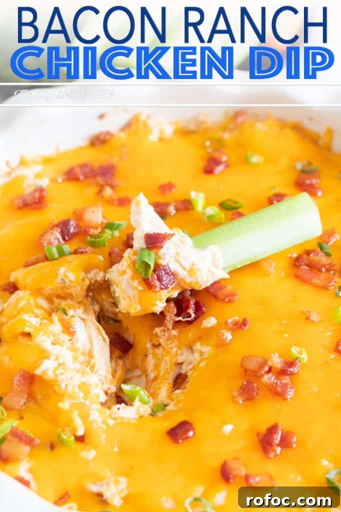 Close up of celery dipping into chicken dip Pinterest Image