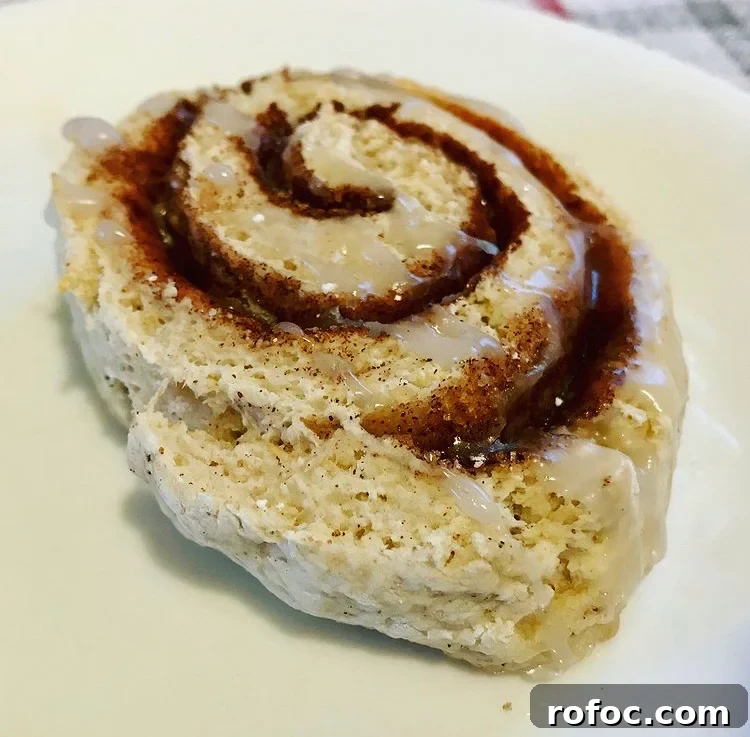 10 Indulgent WeightWatchers Dessert Recipes with Points 4 baked cinnamon roll with 2 ingredient dough, on plate