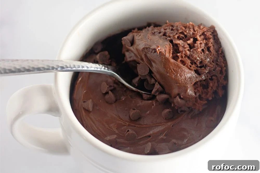 10 Indulgent WeightWatchers Dessert Recipes with Points 8 chocolate WW mug cake with bite
