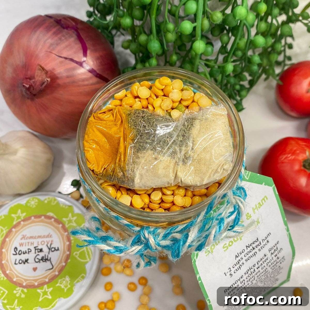 Homemade Bean Soup Mix in a Jar: DIY Kitchen Gift Guide 5 How to pack dry soup mix in a jar. Not seasoning spice pack is on top of the dry ingredients. Fresh veggies in the background.