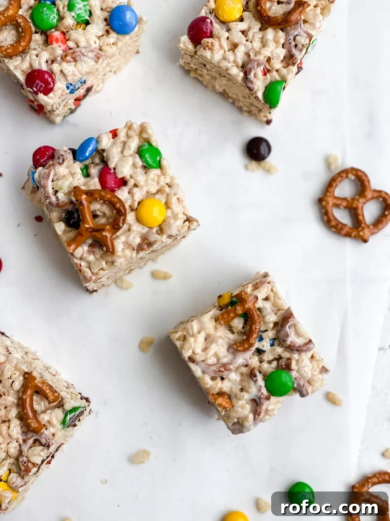 M&M Rice Krispie Treats Recipe: Chewy, Chocolate-Packed Squares 2 M&M rice krispie treats cut and scattered