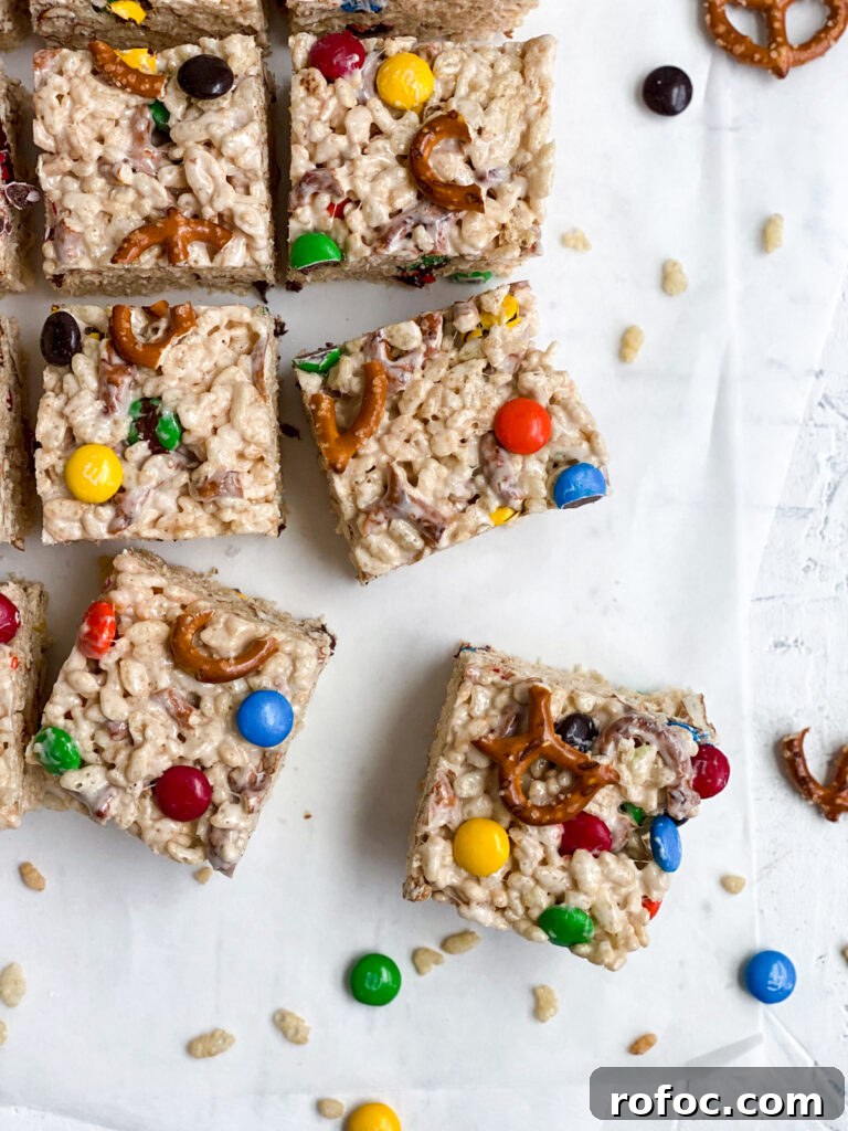 M&M Rice Krispie Treats Recipe: Chewy, Chocolate-Packed Squares 3 M&M's and pretzels surround the rice krispie treats