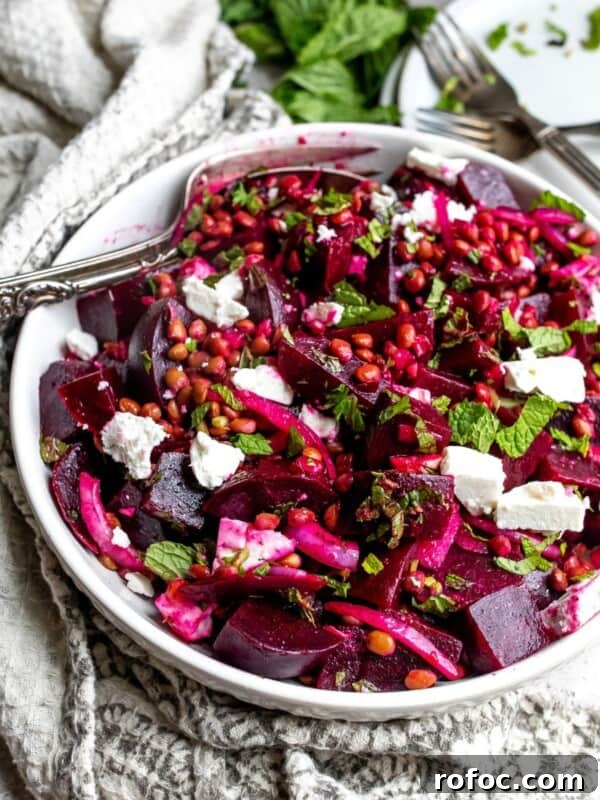 Lemon Honey Orzo with Feta and Fresh Herbs 9 White bowl with beets and feta with a fork.