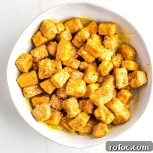 Crispy Orange Tofu — Restaurant-Style Takeout at Home 20 Cubes of crispy tofu, coated in a sticky orange glaze.