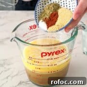 Savory Turkey Injection Recipe for Juicy, Flavorful Roasts 10 Making the turkey injection brine.