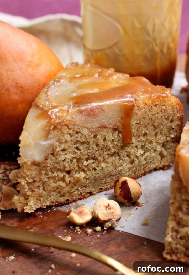 brown butter hazelnut pear upside down cake slice